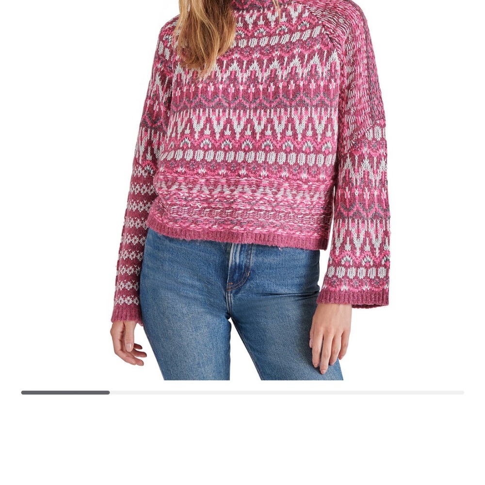 Cozy up to this sequined mock-neck sweater from Steve Madden